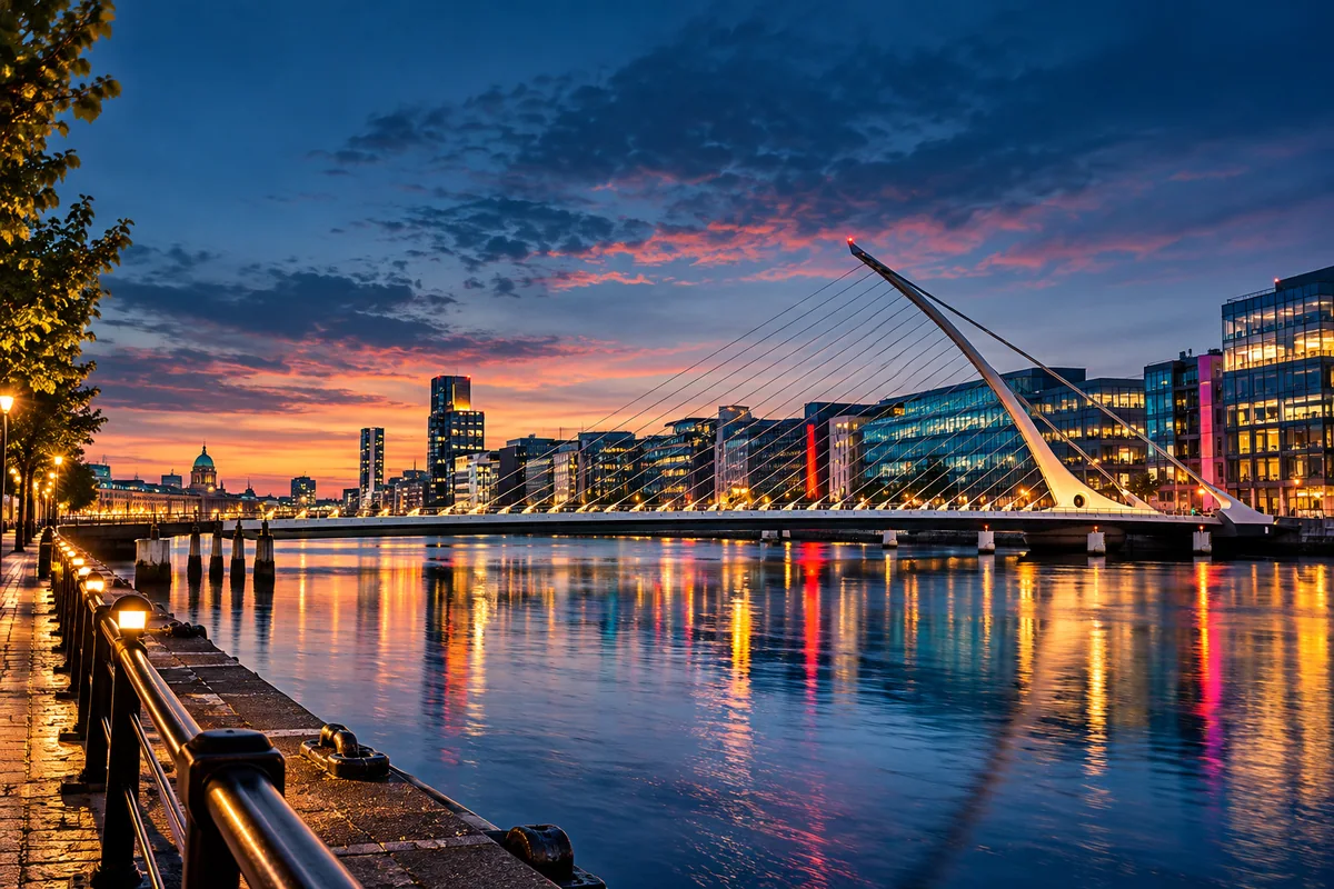Dublin's Samuel Beckett Bridge across the Liffey with colourful evening reflections.